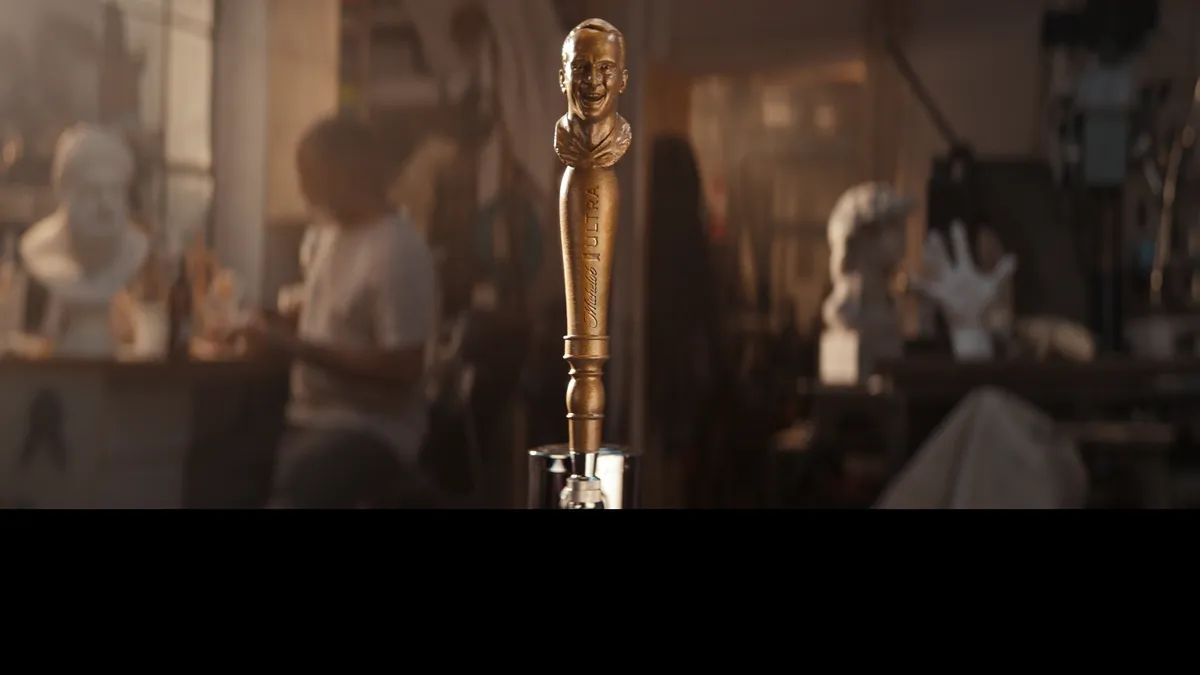 Michelob Ultra's smiling Peyton Manning tap handle busts