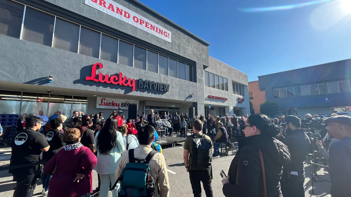 Exterior of Lucky Bayview store during grand opening celebration