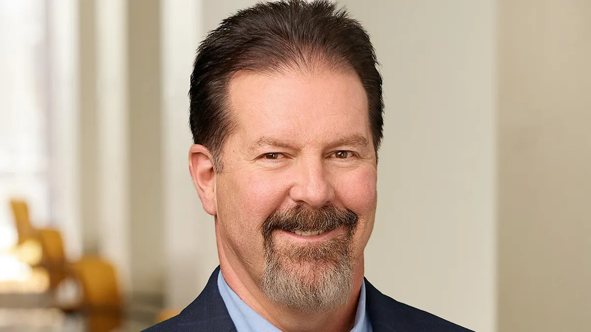 headshot of Brett Helm
