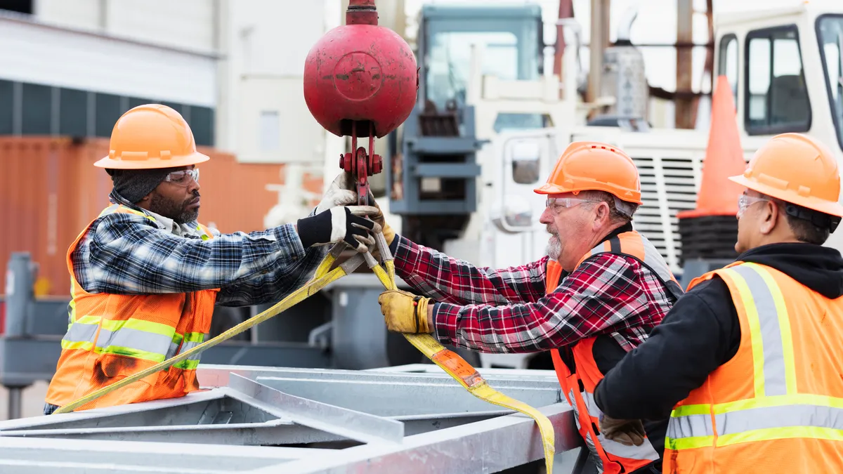 Group of construction workers working together