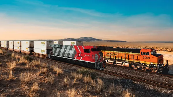 A Ferromex and BNSF rail train transport JB Hunt containers.