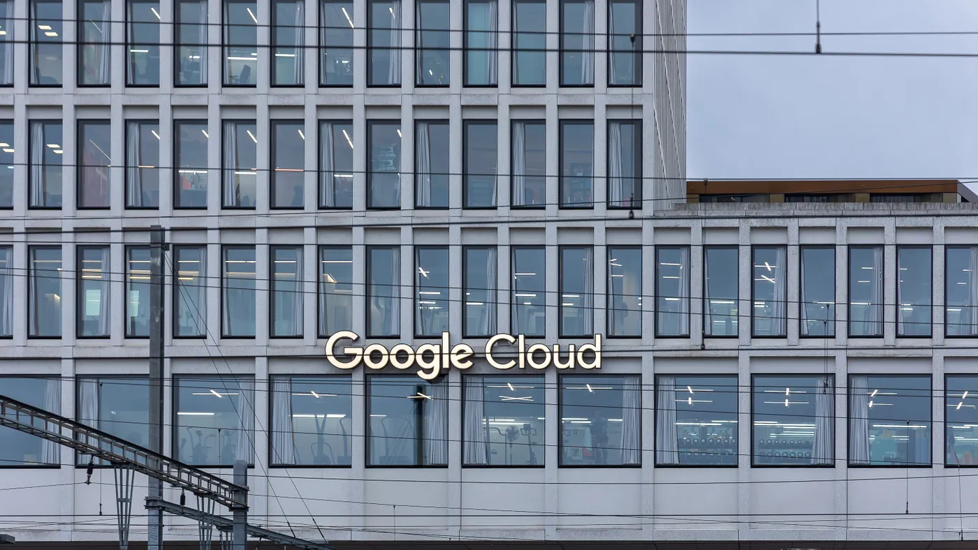 A large building with the Google Cloud company sign is pictured.