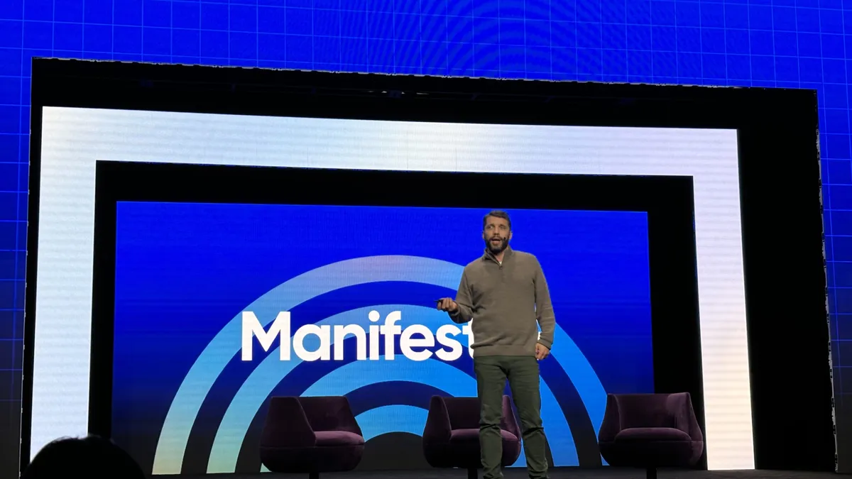 Flexport CEO Ryan Peterson stands on a stage at the Manifest Vegas 2024 conference.