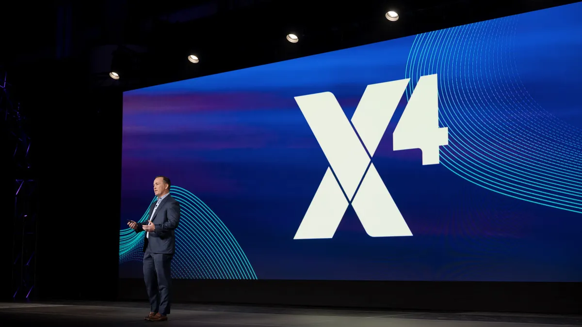 A man speaks on stage.