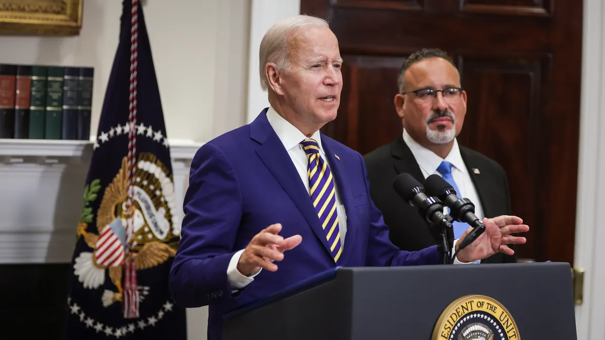 U.S. President Joe Biden, joined by Education Secretary Miguel Cardona, speaks on student loan debt in the Roosevelt Room of the White House August 24, 2022 in Washington, DC.