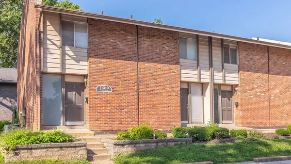 Brown, brick apartment building