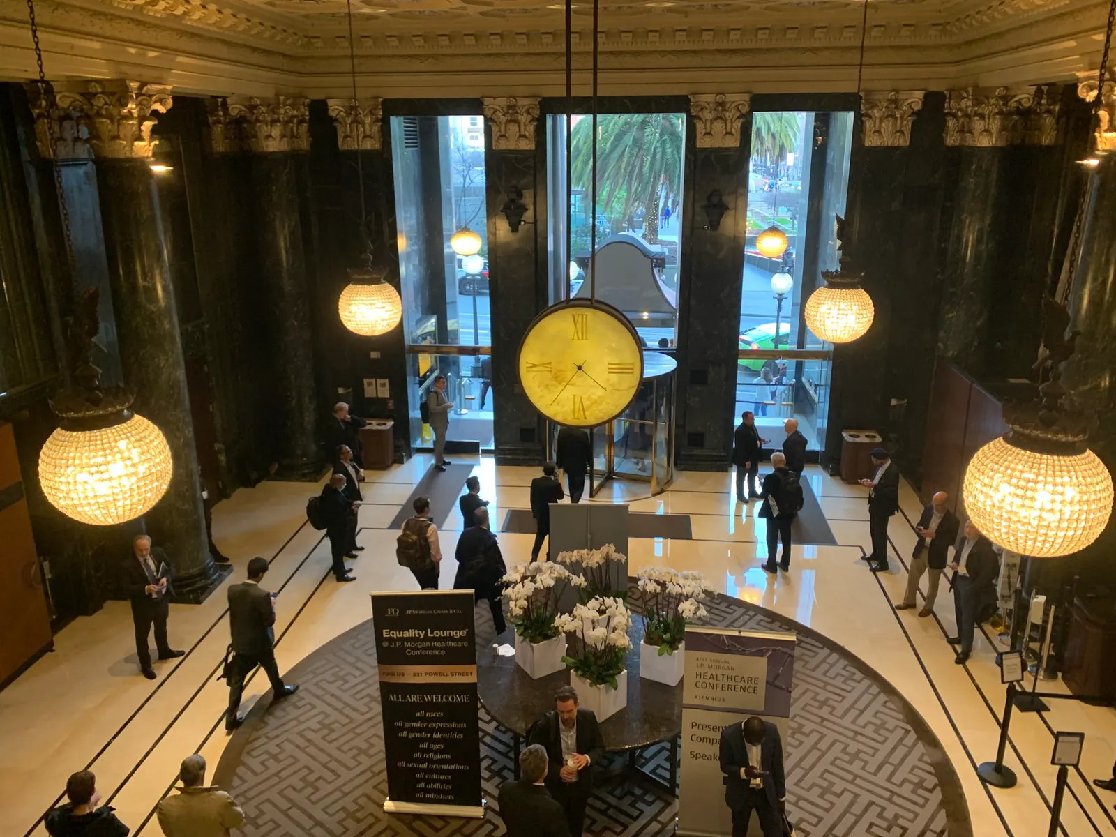People walk through the lobby of the Westin St. Francis in San Francisco on Jan. 10, 2023