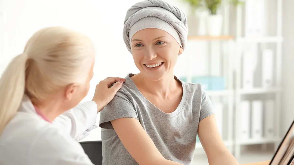 Woman after chemotherapy visiting doctor in hospital
