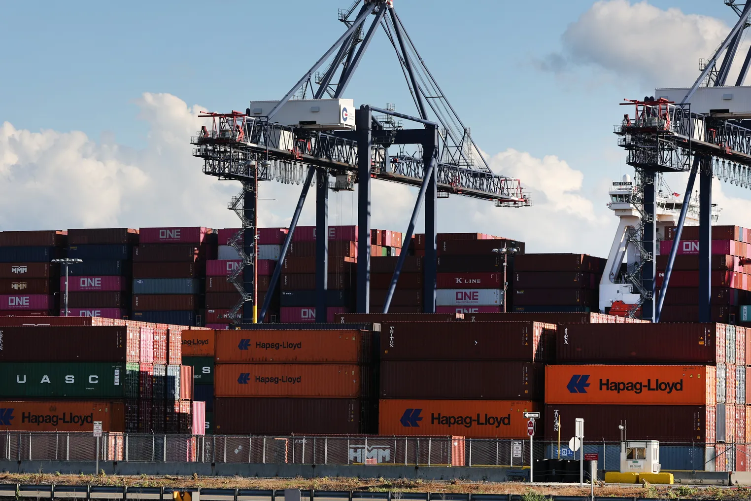 Shipping containers sit stacked in a port on June 09, 2022 in Bayonne, New Jersey.