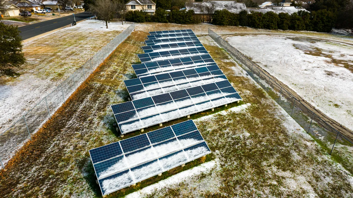 Solar Panels covered in Snow during Winter Storm in Austin , Texas.