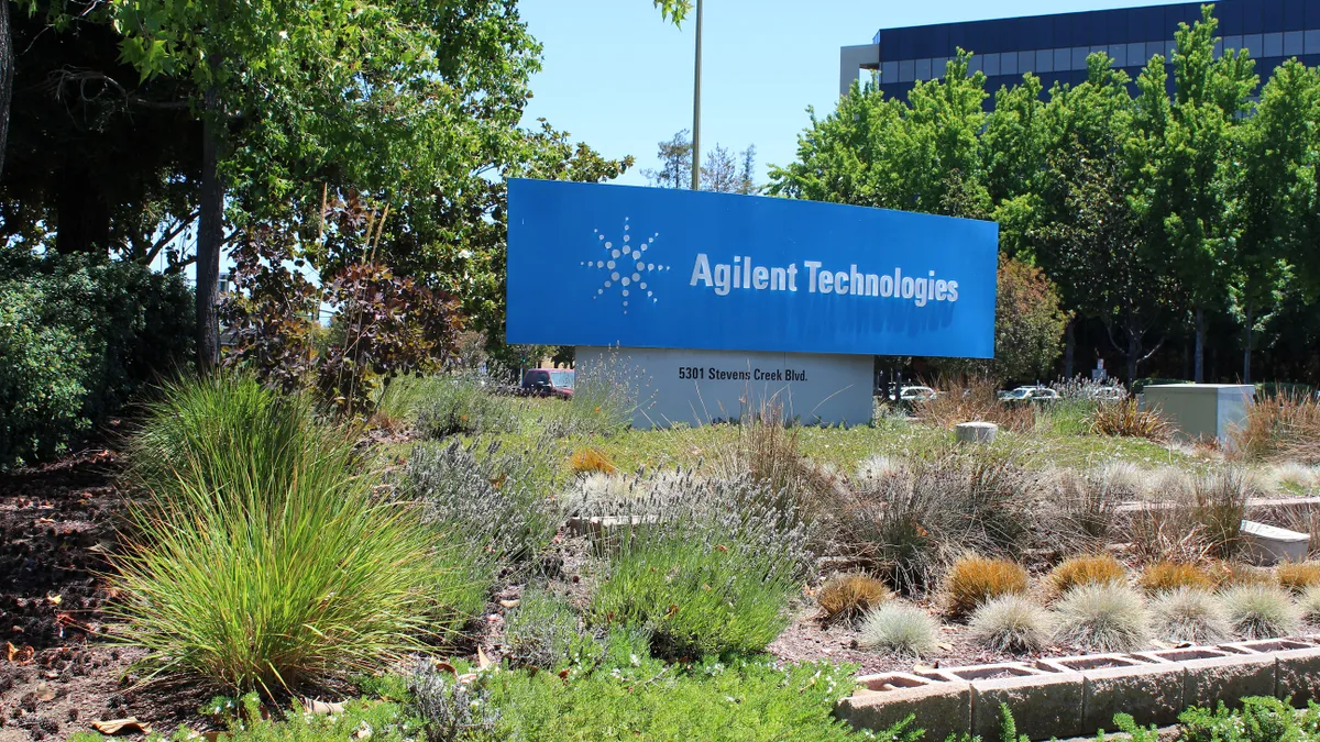 A sign announces the company name at Agilent's headquarters building in Santa Clara, California.