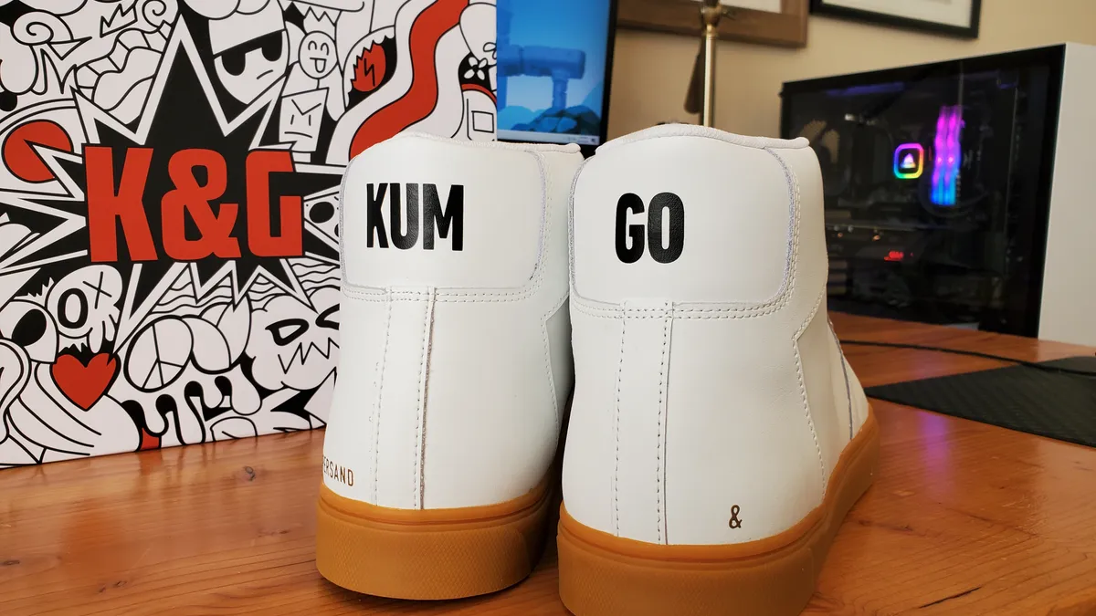 A pair of Kum & Go branded sneakers