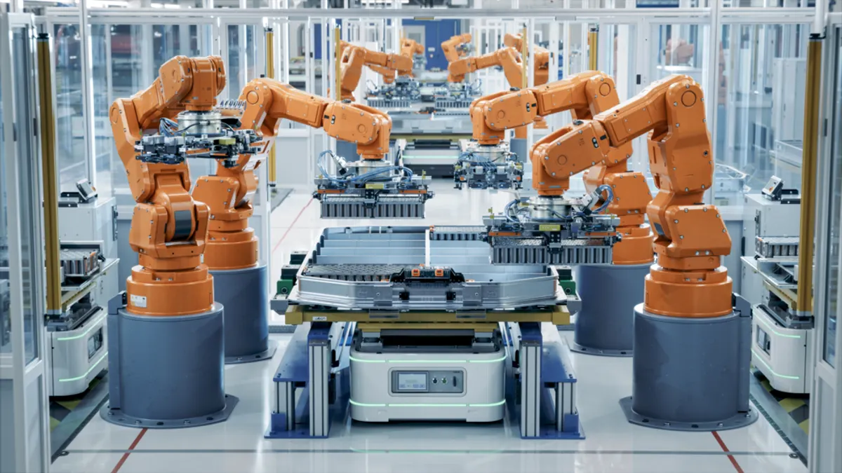 An automated assembly line in an automotive plant, featuring robots and machinery working on vehicle production.