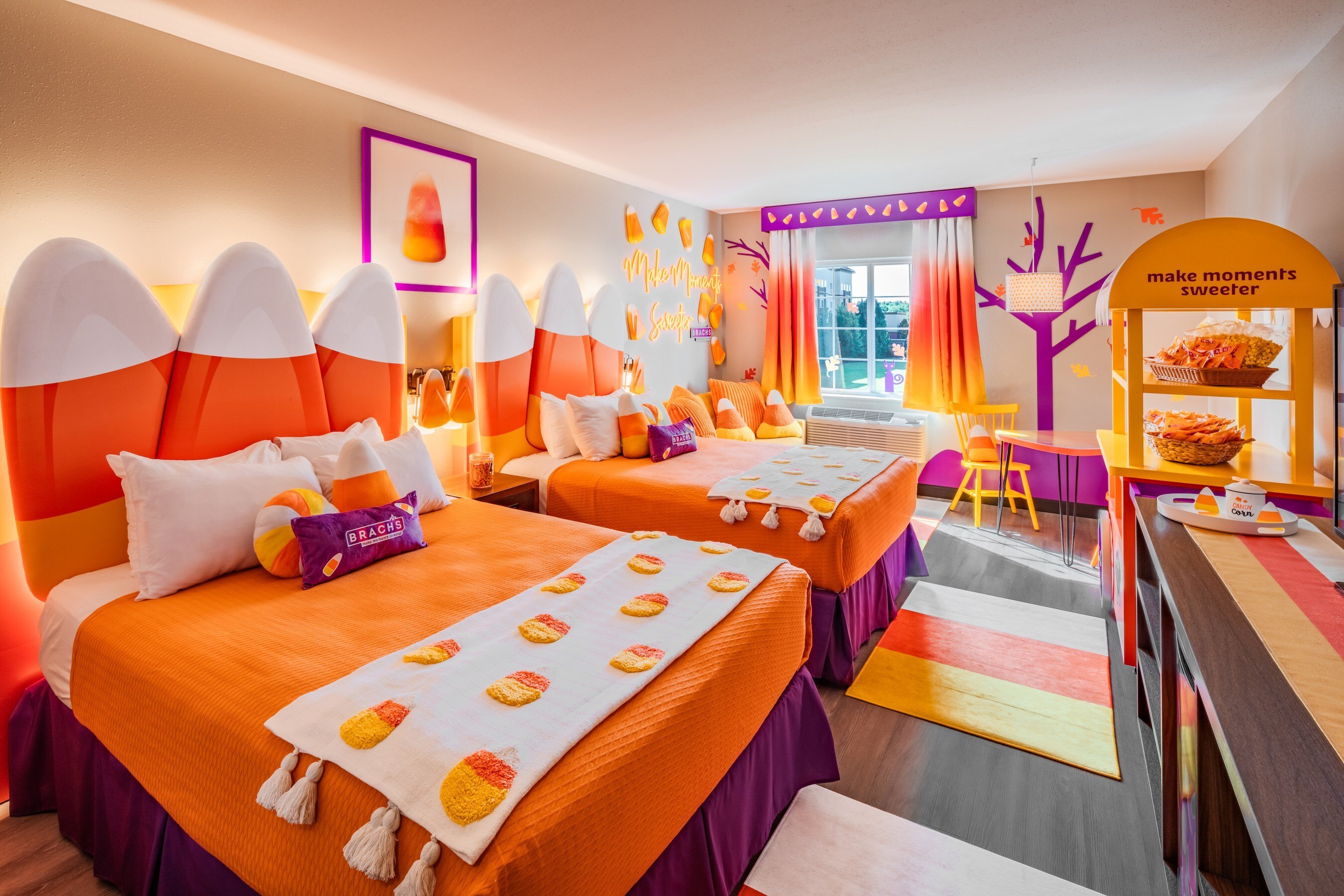 An orange, yellow and white hotel room decorated as the Brach Candy Corn Suite for a sweepstakes.