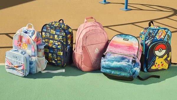 Assorted multicolor backpacks from Walmart lined up