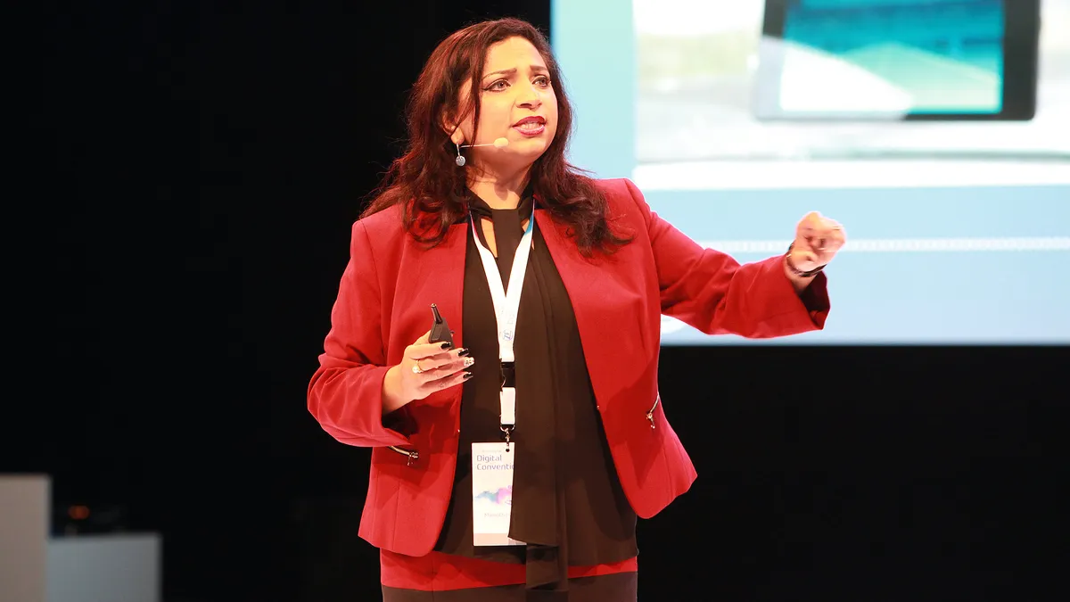 Mamatha Chamarthi delivers a closing keynote at a media event in Nov. 2018.