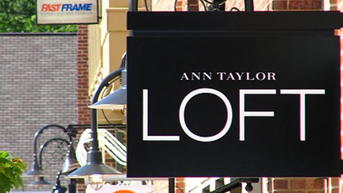 A black store sign that reads "Ann Taylor Loft"