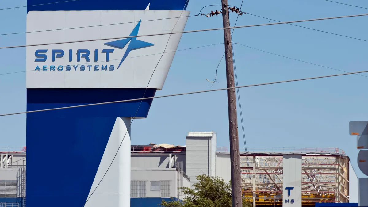 The damaged Spirit AeroSystems sign is seen damaged after an EF3 tornado touched ground on April 15, 2012 in Wichita, Kansas.