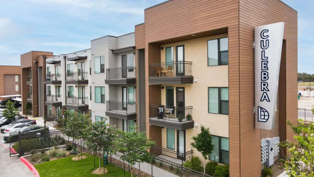 A mid-rise apartment building with "Culebra" written on the side.