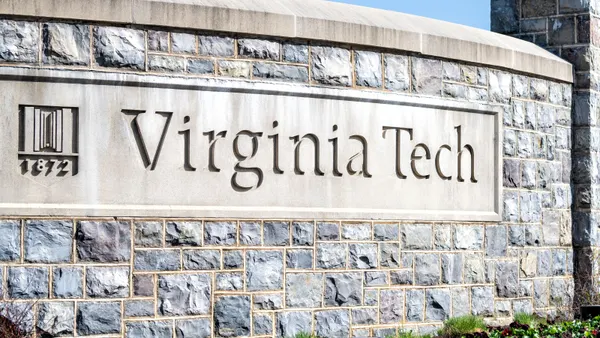 A photo of a stone sign for Virginia Tech.