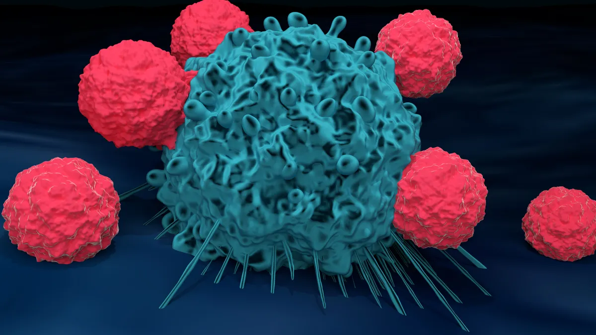 3D rendering of T cells attacking a cancer cell.
