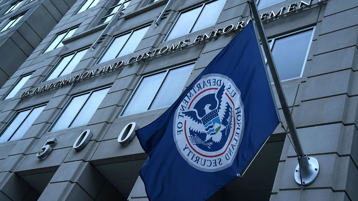 A flag from the U.S. Department of Homeland Security hangs outside the ICE headquarters in Washington, D.C.