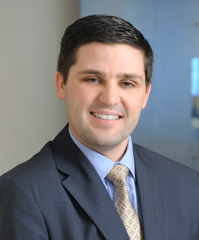 A headshot of construction executive Nathan Lingard.