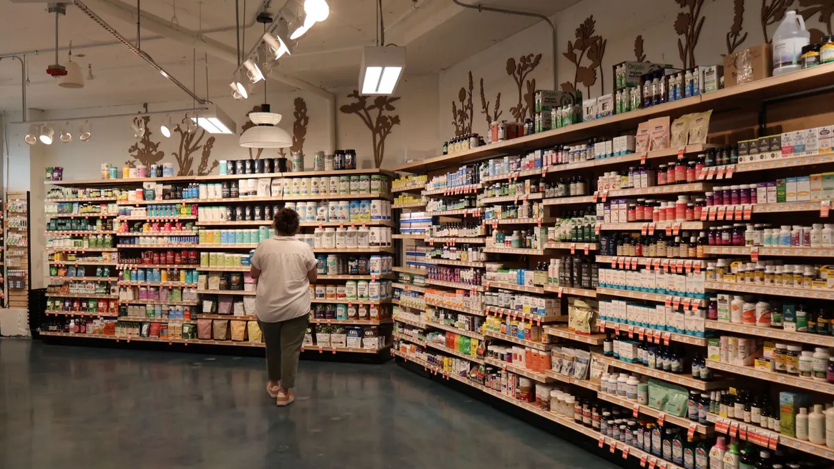 Wellness department in a grocery store that includes vitamins, medicines, supplements and more