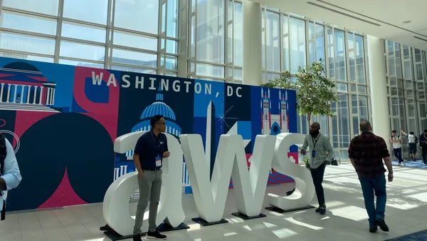 Attendees walk around the Walter E. Washington Convention Center in Washington, D.C during an AWS Summit on June 26-27, 2024.