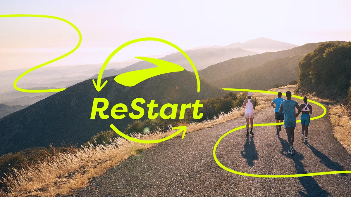 Runners in a mountainous landscape with a yellow "ReStart" logo.