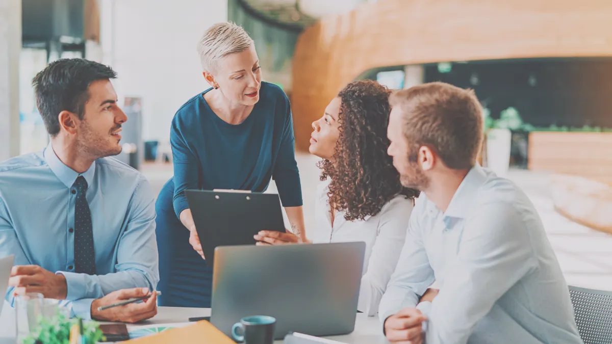 Diverse Team Meeting Together