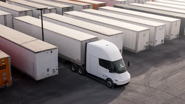 An Einride Tesla Semi in a lot of trailers.