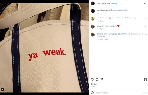 A white tote bag with "ya weak." written on it.