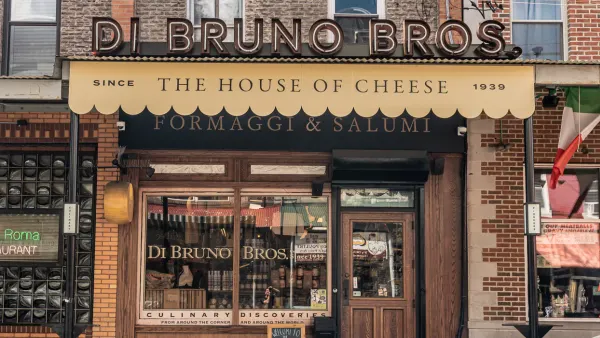 Exterior of a grocery store with a sign that reads "Di Bruno Bros." in capital letters above the entrance.