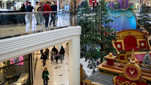 Mall setting with shoppers walking