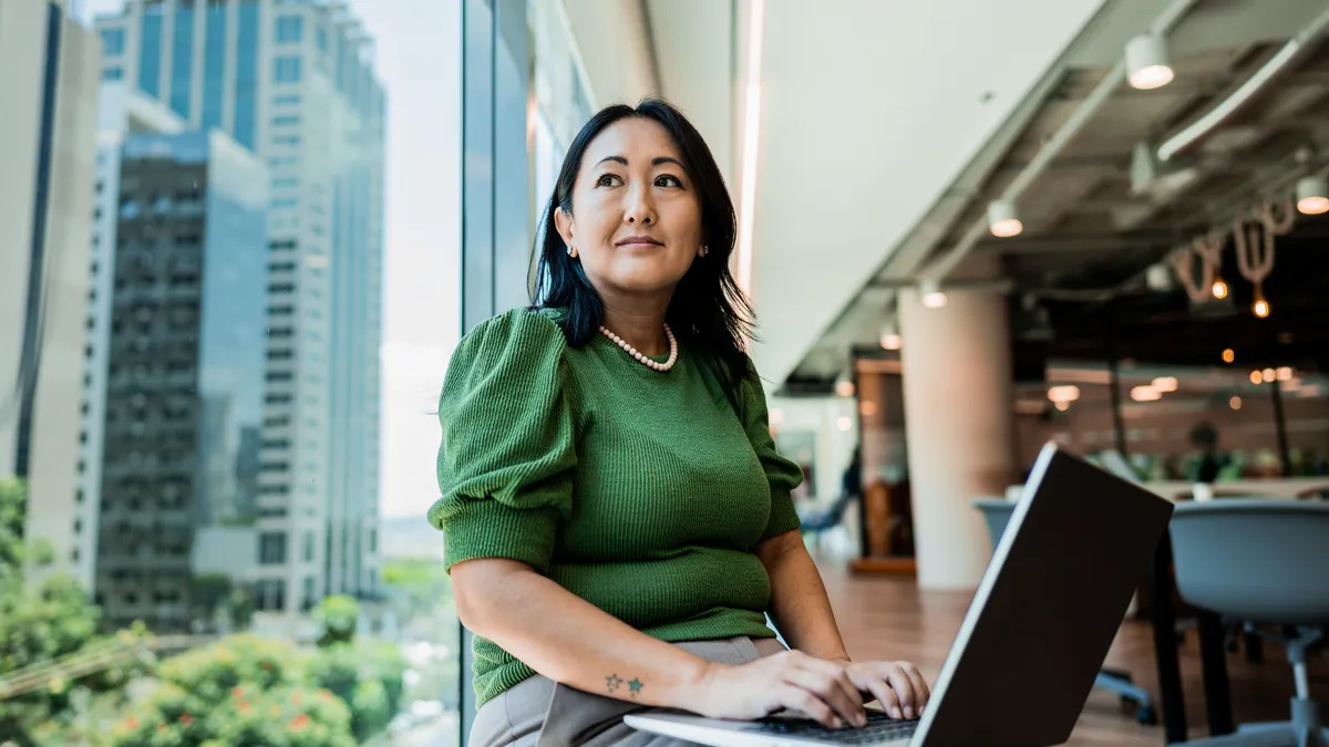 Businesswoman contemplating on the office
