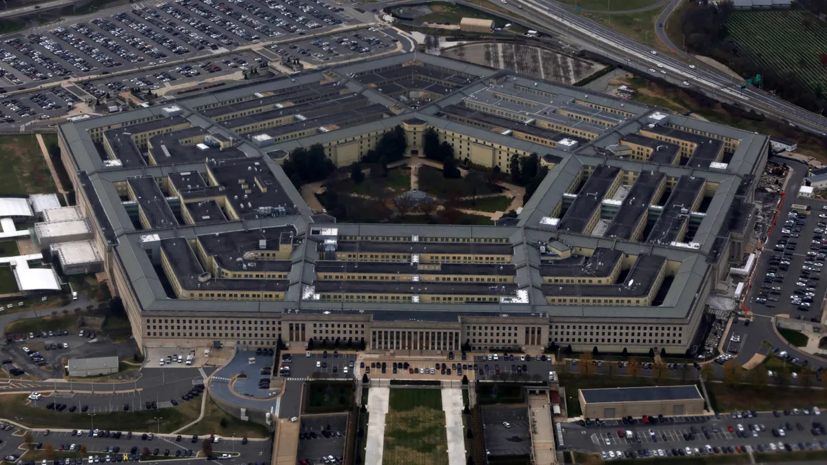 An aerial view of a massive building.