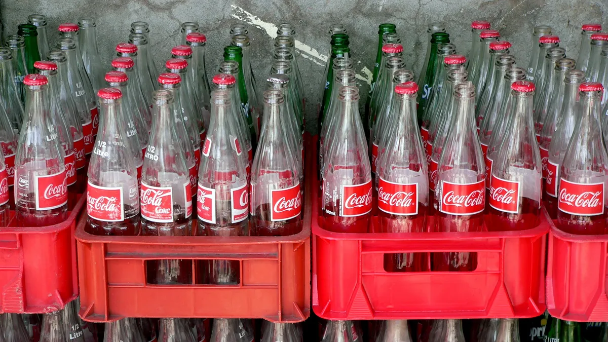 Stacks of empty glass Coke bottles