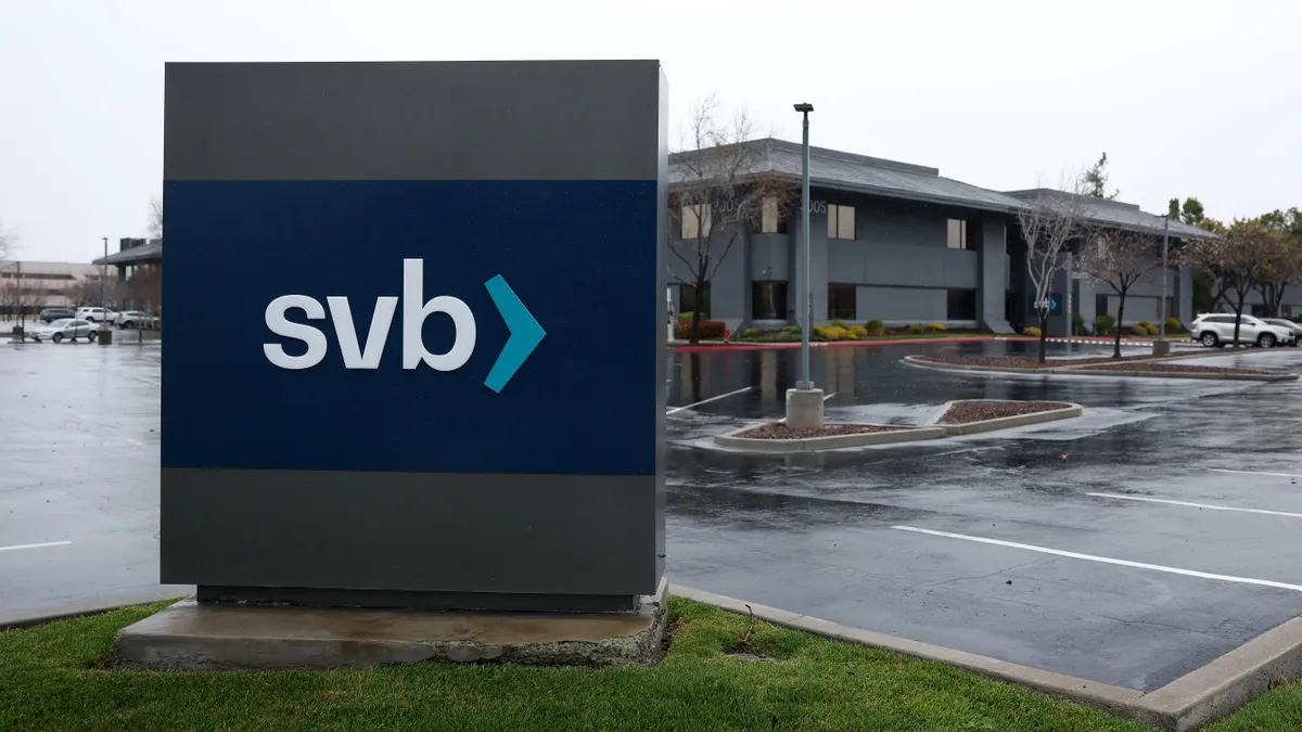 An SVB sign stands outside the bank's headquarters.