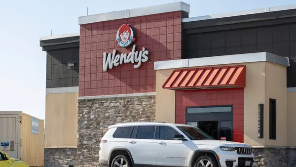 A cart at a Wendy's drive-thru window.