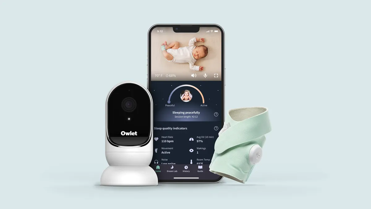 An Owlet Mint Dream baby monitor