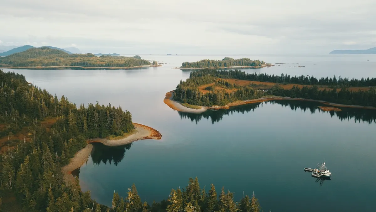 Image of water body with boat in the water