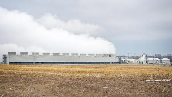 Steam rises from a power plant.