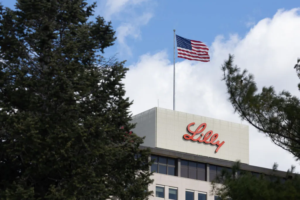 Eli Lilly headquarters exterior with American flag flying