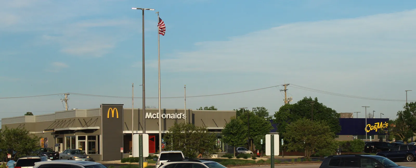 Two fast food restaurants beside each other.