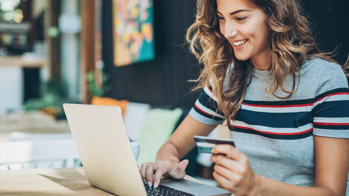 Young woman shopping on-line