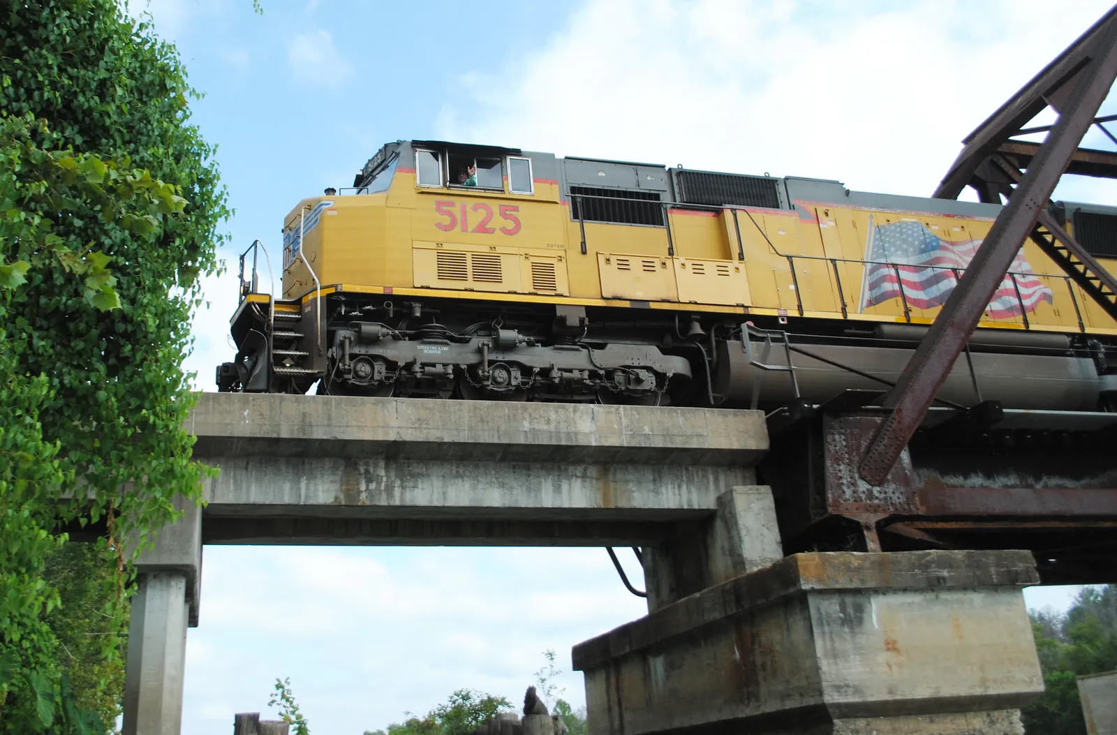 A Union Pacific train travels across a bridge in Riverside, Texas.