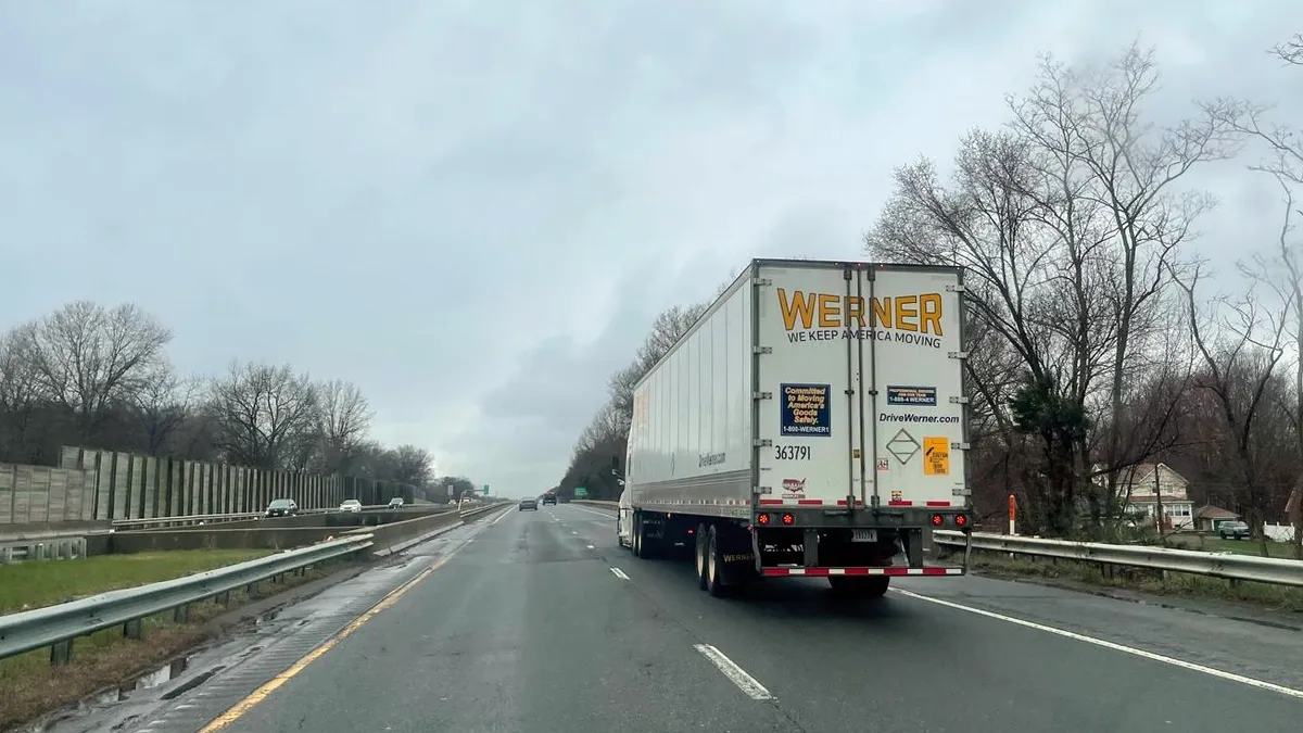 A Werner tractor-trailer on a highway.