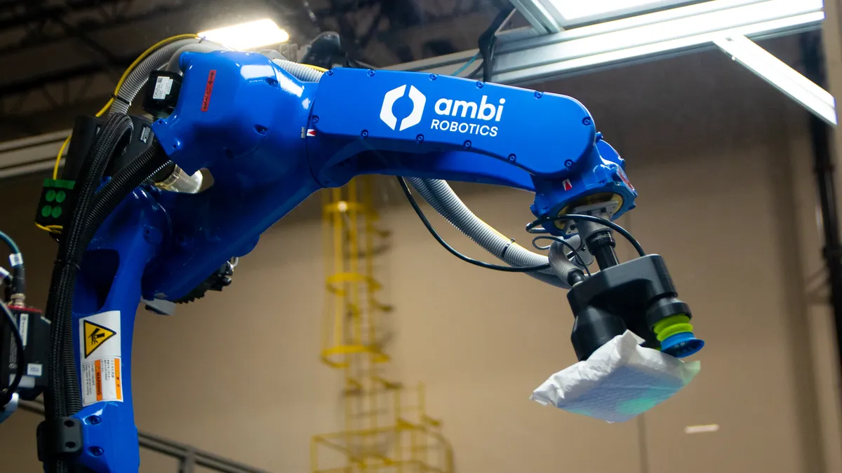 The automated AmbiSort system handles a parcel in a Pitney Bowes e-commerce hub in Bloomington, California.