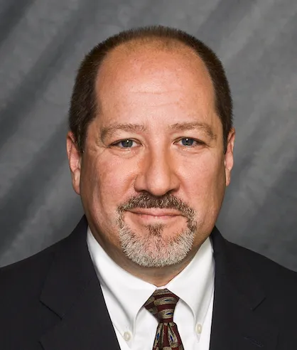 A headshot of construction attorney Eric Singer.